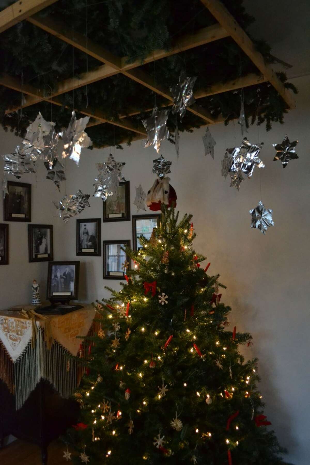 The lights of the Christmas tree sparkle on the tin foil stars of the Finnish heaven. (Meg LeDuc/News Advocate)