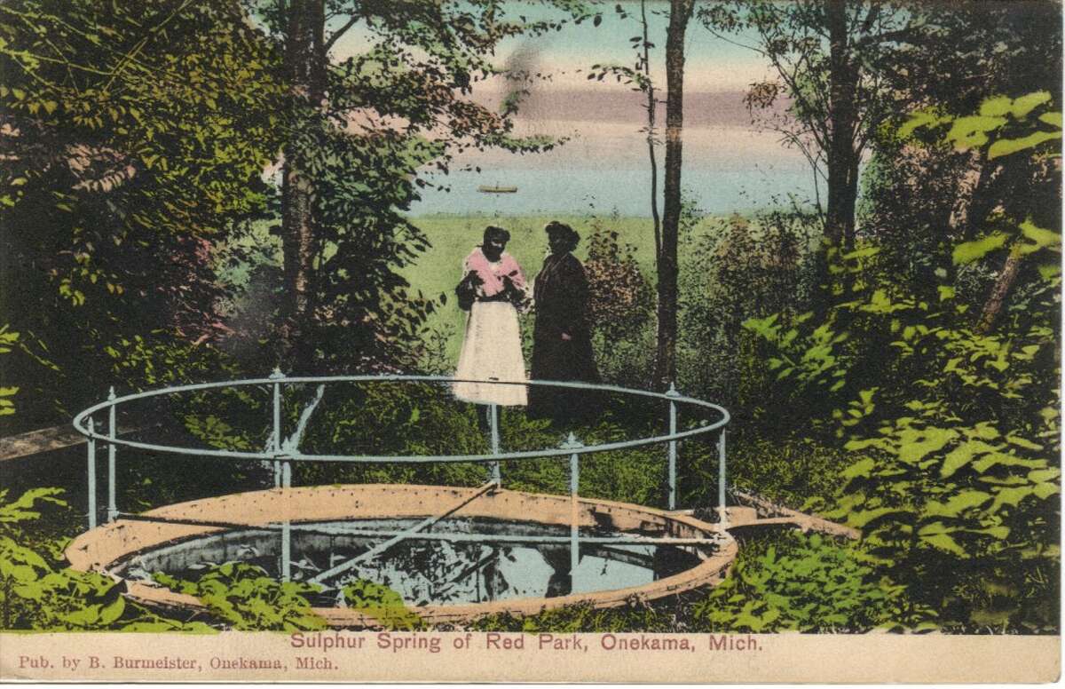 This photo from the early 1900s shows the sulphur, or “mineral water,” well at Red Park, located on the south shore of Portage Lake near Onekama. (Courtesy Photo/Manistee County Historical Museum)