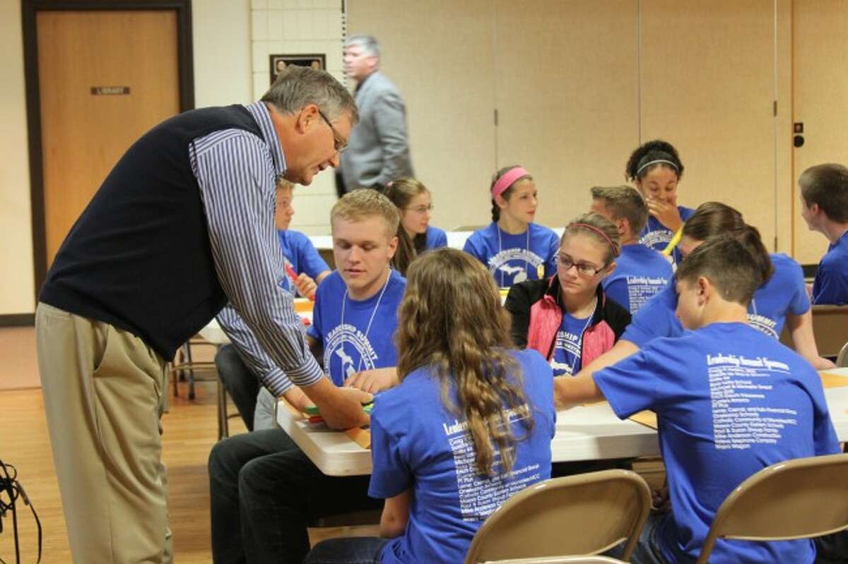 Students from the West Michigan D League took part in a leadership summit on Tuesday at the St. Joseph Parish Center. Main speaker Tom Heethuis is shown working with some of the students at the summit. A total of 90 students took part in the summit.