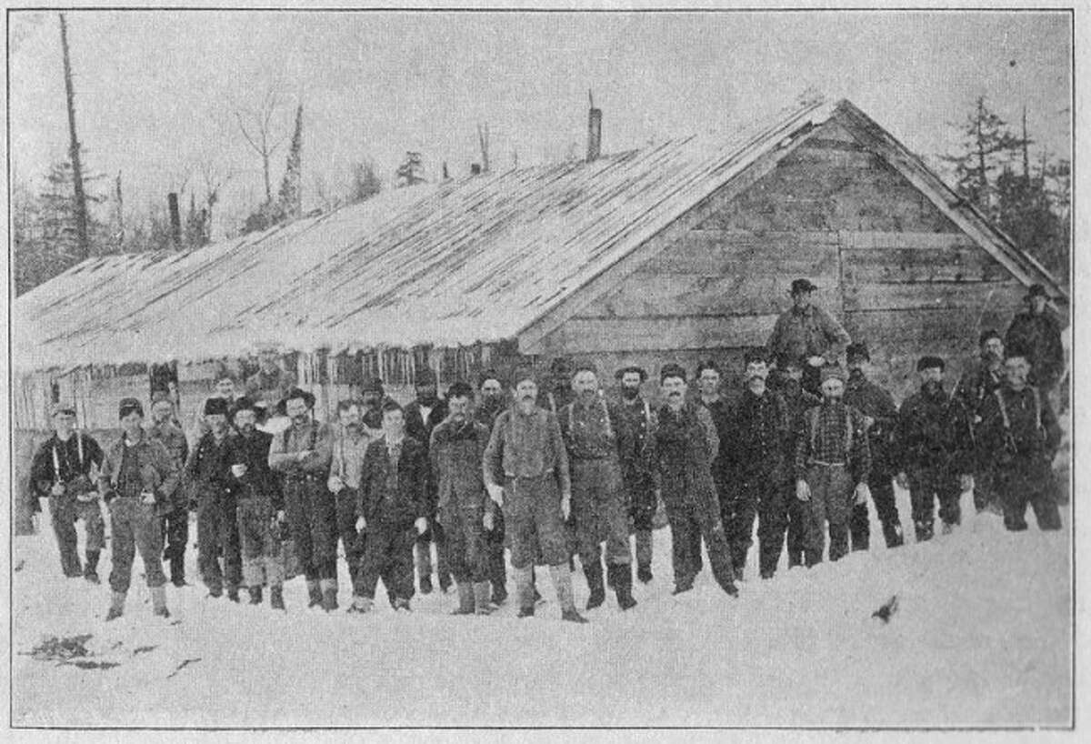 Shown is a work crew from one of the many logging camps in Manistee County.