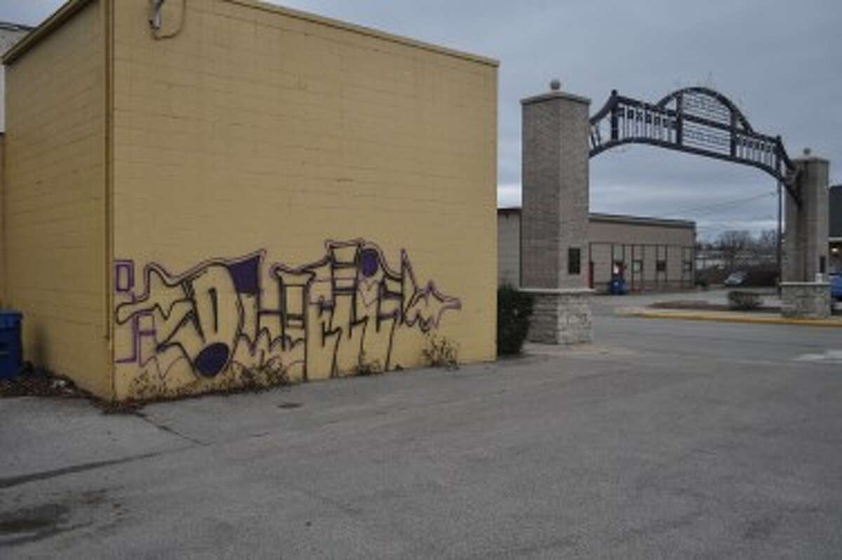 The graffiti at American Cleaners was applied late Tuesday or early Wednesday. (Eric Sagonowsky / News Advocate)