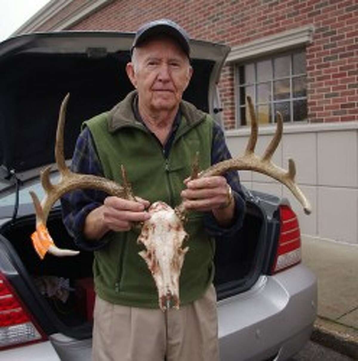 Robert Iverson of Bear Lake shot what he figures might be his 80th deer on opening day of firearm season. He shot the 10-pointer, which weighed 153 pounds and had an antler spread of 23 inches, in Pleasanton Township and won the buck pole contest in Irons. (Dave Yarnell/News Advocate)