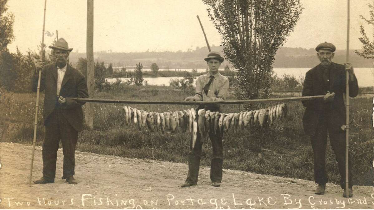 This photo shows the results of an early 1900s fishing excursion on Portage Lake near Onekama. (Courtesy Photo/Manistee County Historical Museum)
