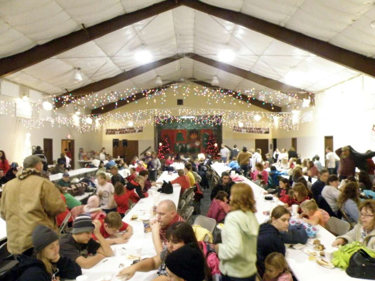 Stronach Township Hall will be bustling again this year on Saturday evening when Marquette Rail’s Santa Express rolls into town. Activities, sponsored by the Stronach Township Fire Department, will run from 5 to 9 p.m. and the Santa train is scheduled to arrive at 6:40 p.m. It will also arrive at the Manistee First Street crossing at 7:25 p.m. (News Advocate File Photo)