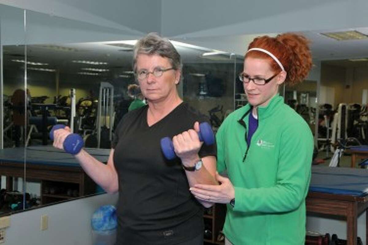 Jessica Pyrah (right) of the West Shore Health Connection helps Mary Weishaar in an exercise routine. (Courtesy Photo/West Shore Medical Center)