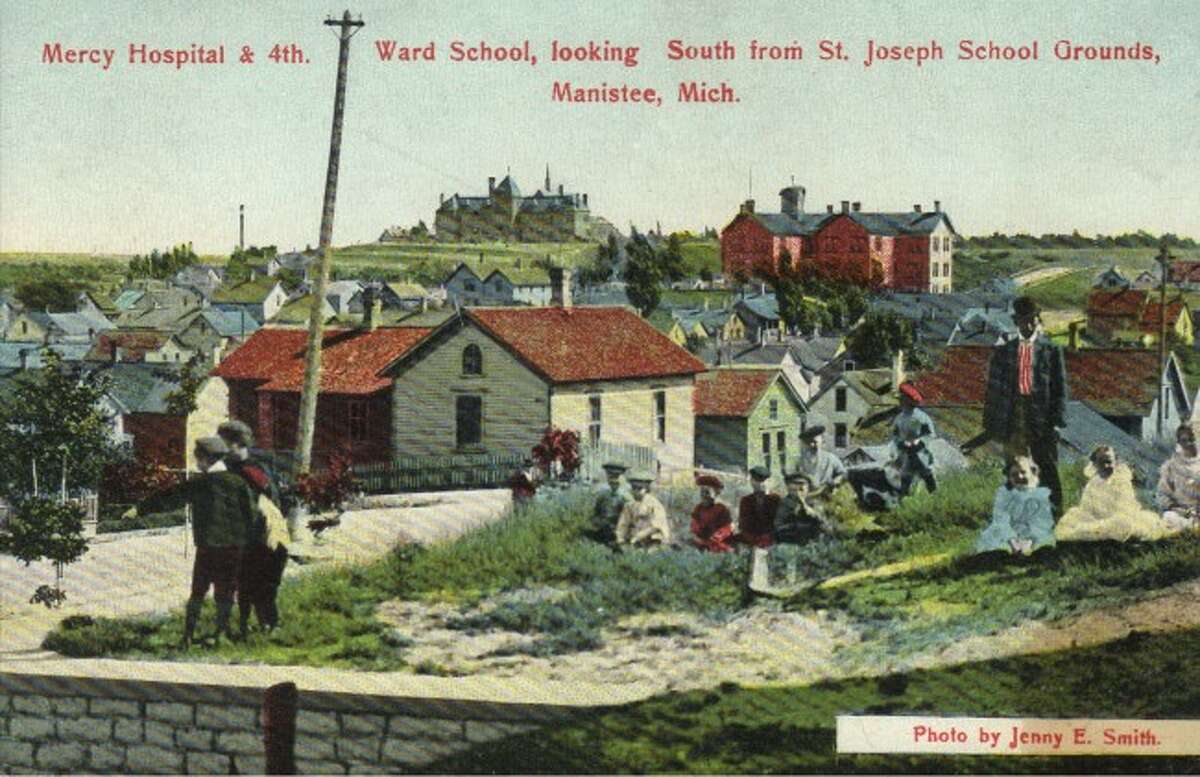 Shown is the old Fourth Ward school and Mercy Hospital.