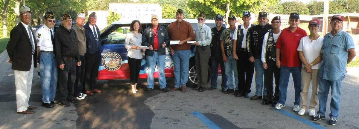 Several area veterans gathered this week to donate funds to the Manistee County D.A.V. veterans van program.