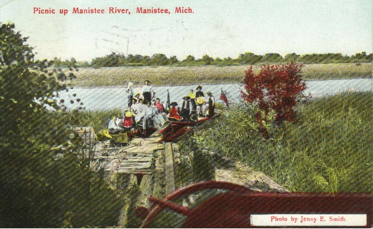 Just like modern times, in the early 1900s area residents enjoyed boating and picnicking on the Manistee River. (Courtesy Photo/Manistee County Historical Museum)