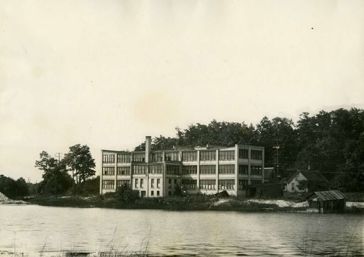 The Manistee Watch Factory that was located on Arthur Street in the location of the Joslin condominiums is shown in this photograph from the 1920s.