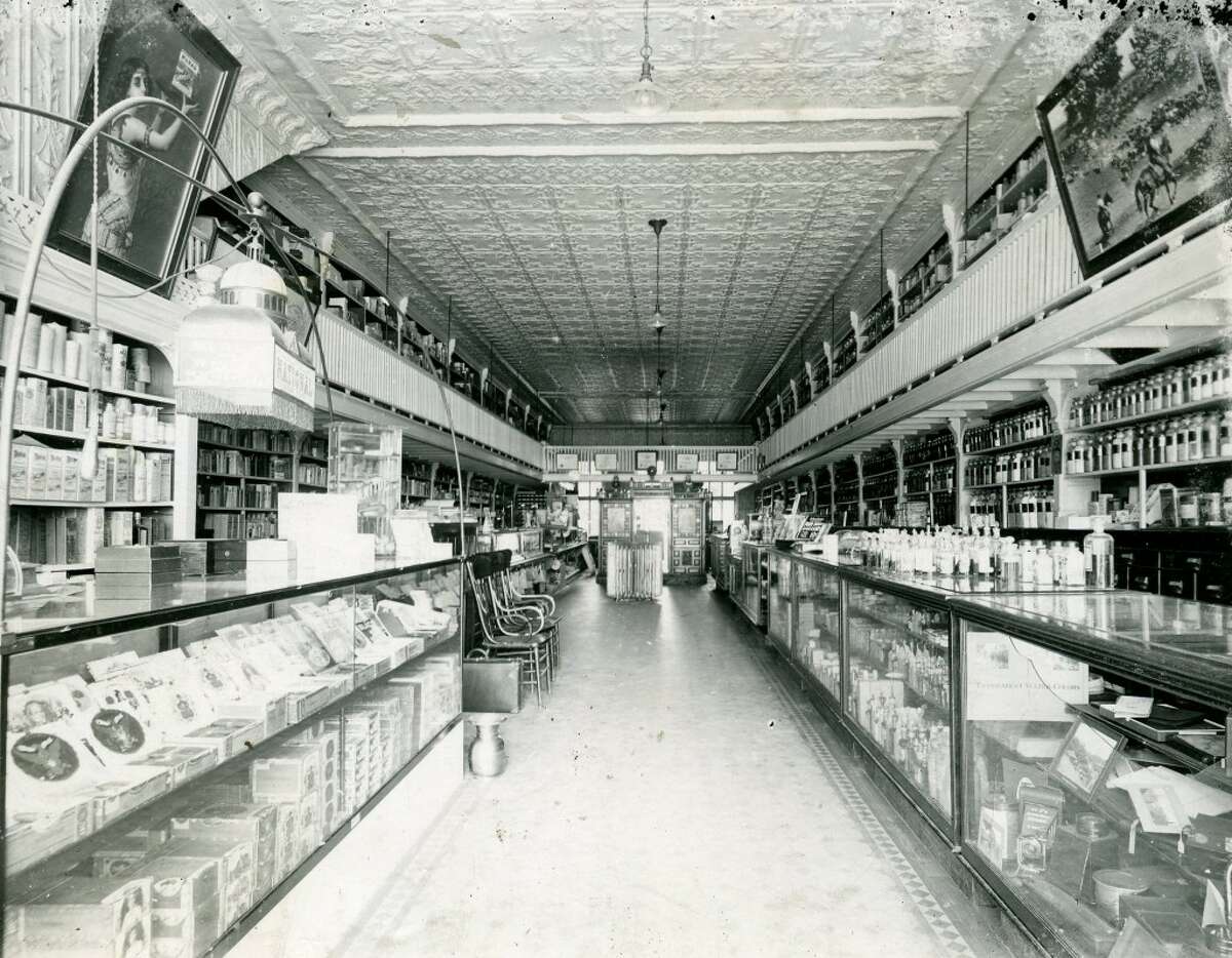 An early 1900s view inside the The A.H. Lyman Drug Company, which is the current River Street location of the Manistee County Historical Museum. Many of the fixtures seen in the photo remain on display at the museum. (Courtesy Photo/Manistee County Historical Museum)