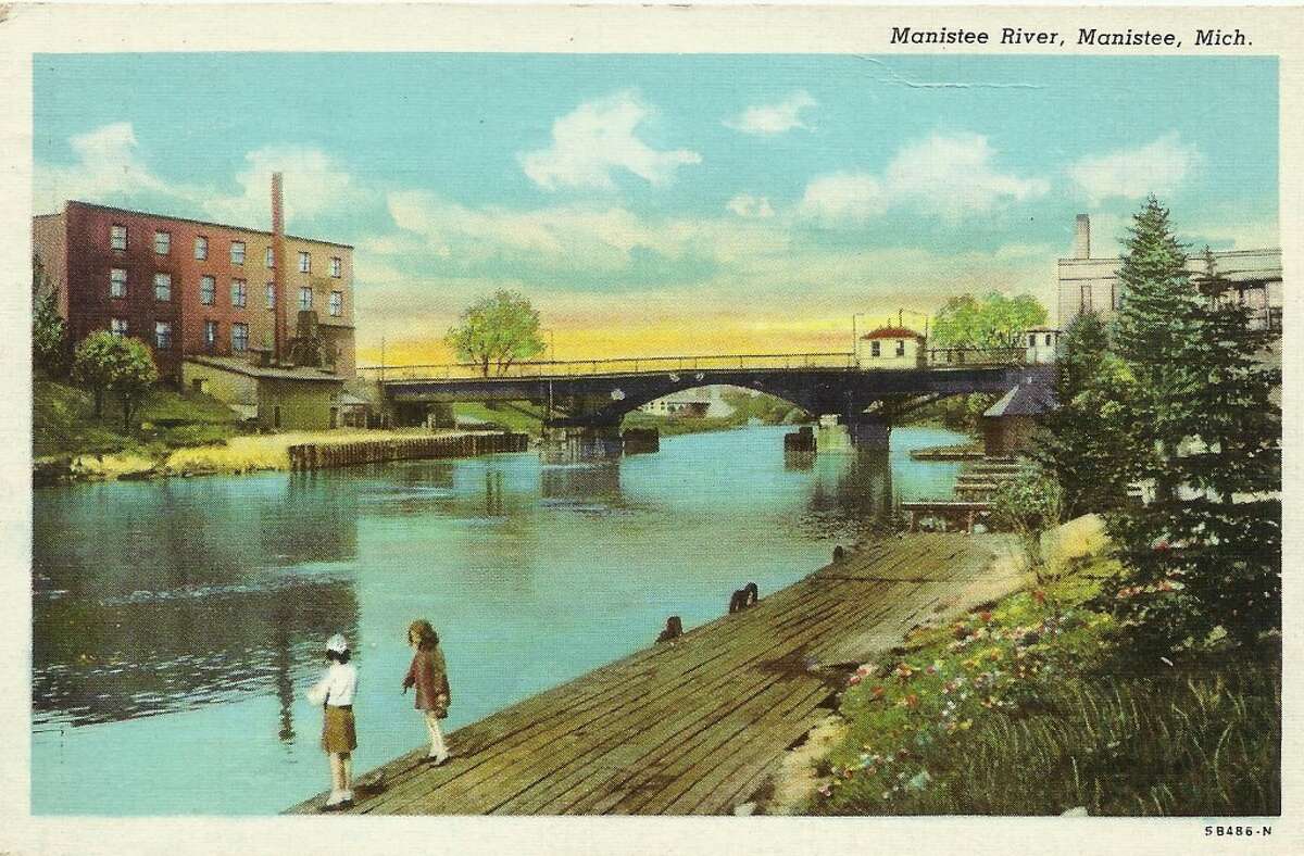 An early 1900s view of the Maple Street Bridge looking east from the south bank of the Manistee River Channel in Manistee. (Courtesy Photo/Dale Picardat)