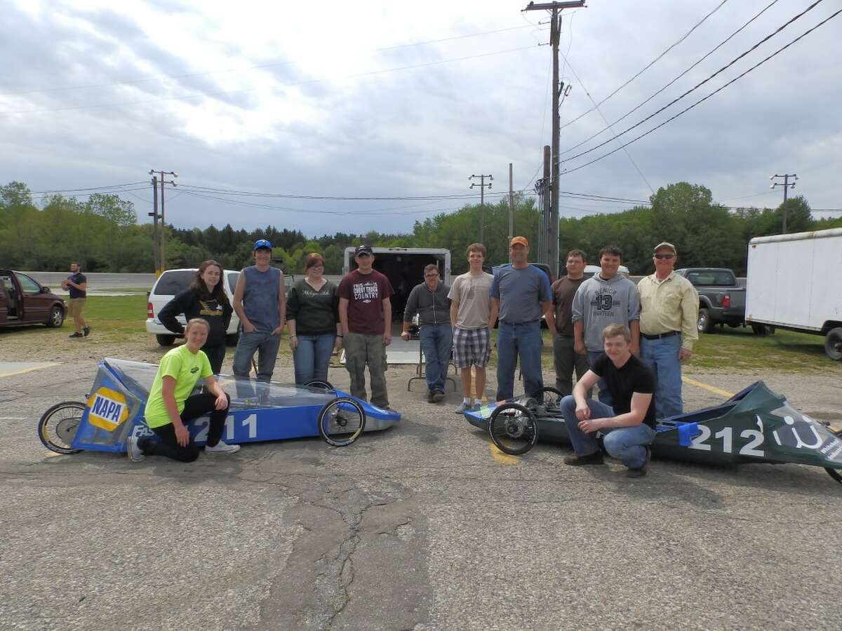 Pictured are students from the Career and Technical Education Welding and Mechatronics programs that attended the National Electric Cart Association race at Berlin Raceway. Shown left to right are Ashleigh McCabe (Mason County Central), Teresa McCann (Mason County Central), Cody Leedham (Ludington High School), Megan Cross (Mason County Central), Josh Powers, (Mason County Central), Travis Raspotnik, paraprofessional, Robby Waite, LHS, Matt Scott, Instructor, Sid Mickevich, MCE, Tom Foster (Manistee High School), Doug Larsen, paraprofessional, Sutton Giffels (Manistee High School).