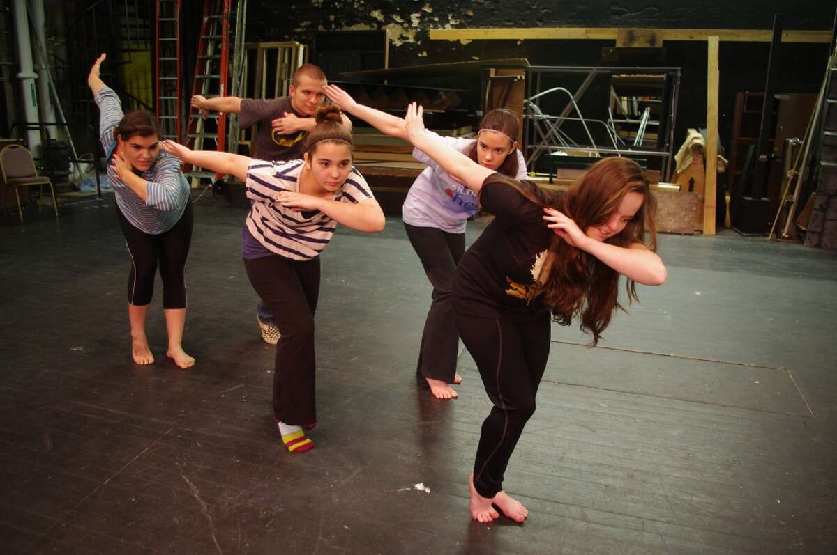 Tiger Lily, played by Elizabeth Thompson, leads fellow Indians during a rehearsal for the Manistee Civic Players production of “Peter Pan.” The Indians are (from left to right) Casey Granada, Tucker Laws, Autumn Carter and Lauren Borucki. The show opens June 28 at Manistee’s Ramsdell Theatre. (Dave Yarnell/News Advocate)