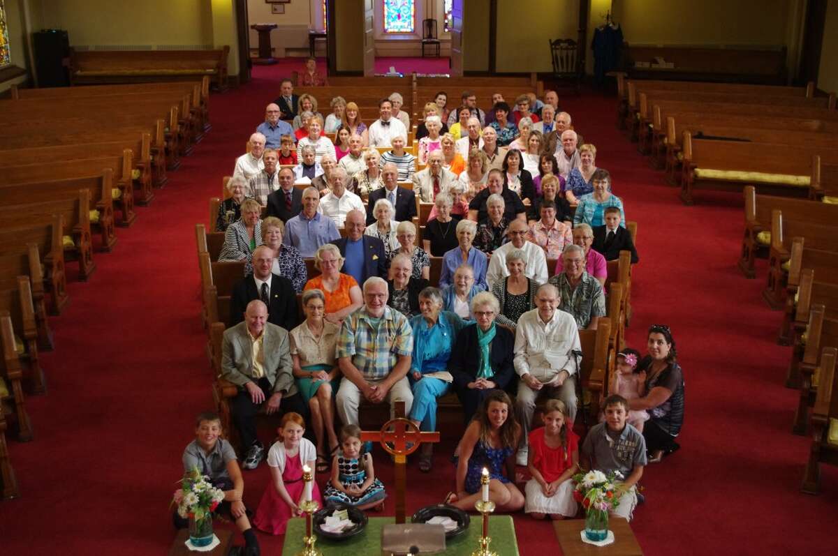 After Sunday's worship service to observe the 150th anniversary of the founding of the First Congregational Church in Manistee, those present posed for this photograph. (Dave Yarnell/News Advocate)