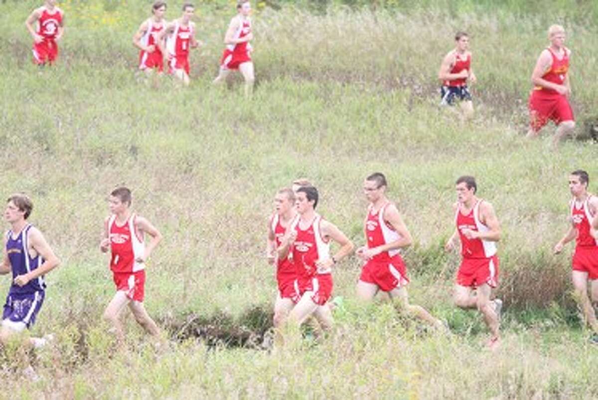 The Bear Lake boys team moves across the course at Mason County Eastern during Wednesday’s West Michigan D League jamboree. (Matt Wenze/News Advocate)