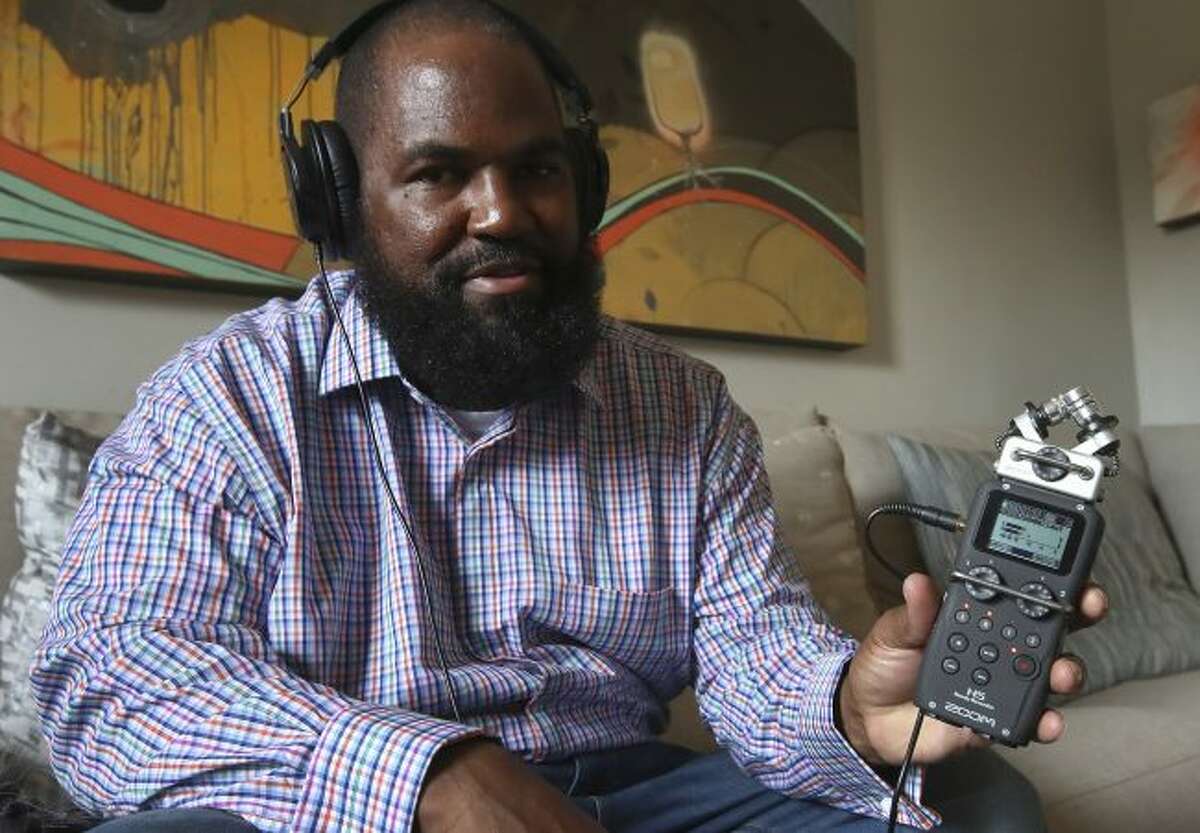 In this Dec. 19, 2018, photo, Earlonne Woods shows recording equipment similar to what he used in San Quentin State Prison to produce his podcasts, during an interview in Oakland, Calif. Woods, 47, was recently released from San Quentin prison after California Gov. Jerry Brown commuted his 31-years-to-life sentence for attempted armed robbery. (AP Photo/Ben Margot)