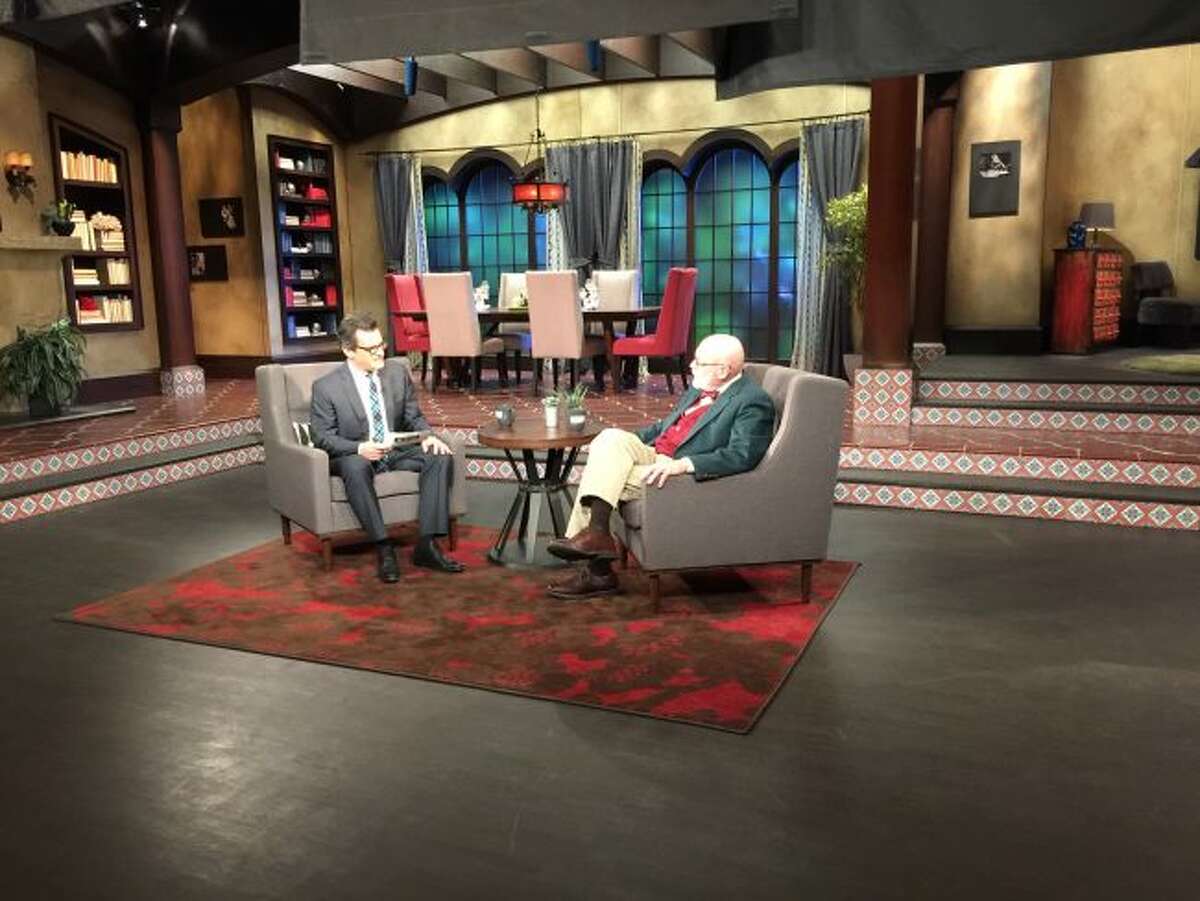 Ken Cooper (right) talks with Ben Mankiewicz, host of Turner Classic Movies, on the set in Atlanta, Ga., during a shoot for Cooper's introduction of the film "The Music Man," which will air on TCM in April. (Courtesy photo)