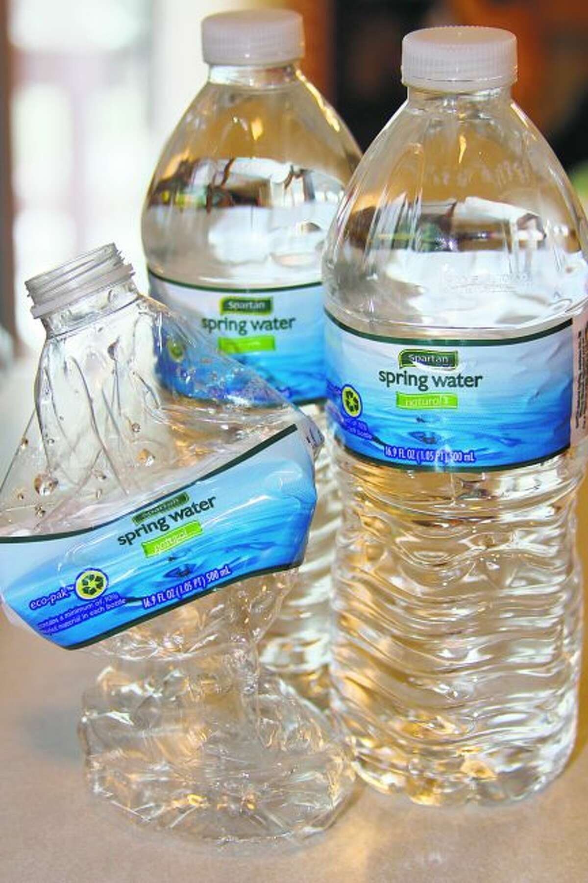 Add deposit to water bottles or raise landfill rates?