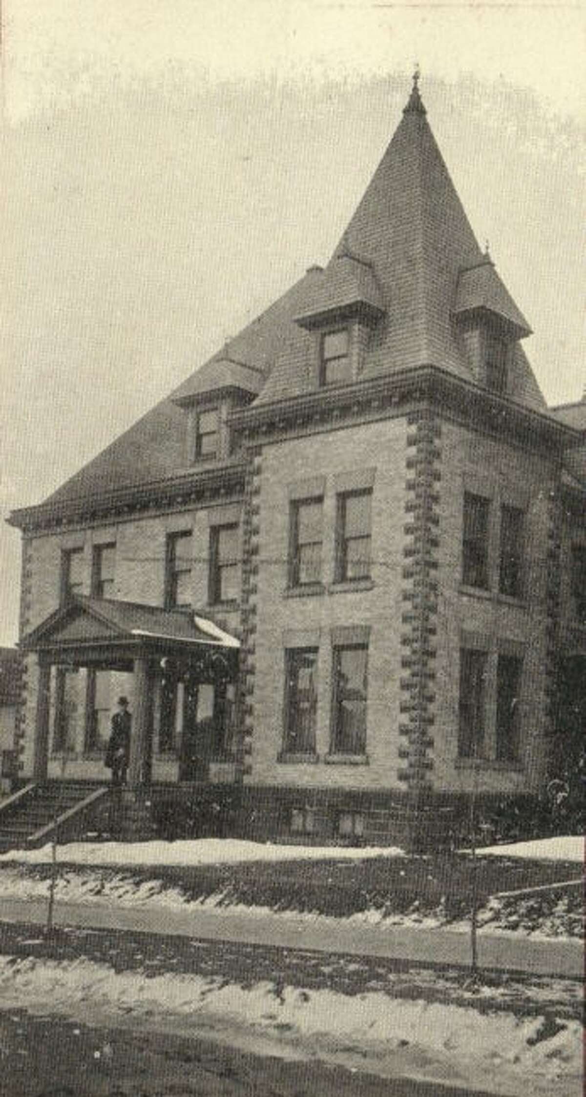 The Guardian Angels parsonage is shown in this photograph that was taken in the early 1900s.