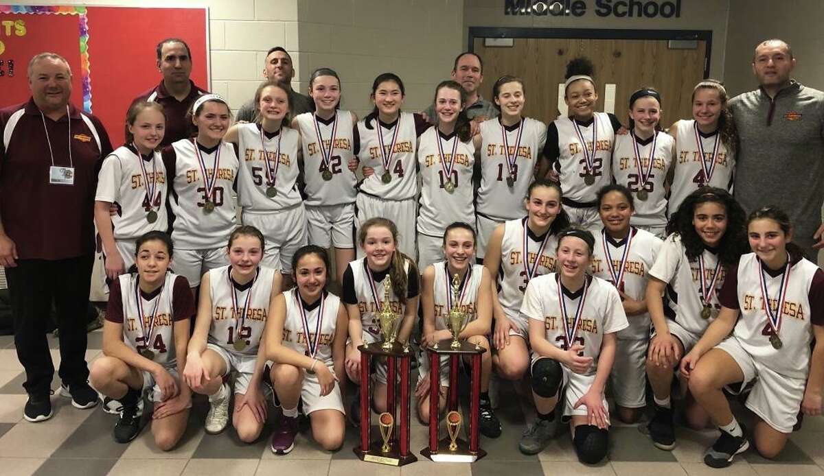 Players from the championship teams (front row) are: Maddie Wilkins (6th Grade), Remy DeNomme (6th Grade), Caitlyn Elmo (6th Grade), Molly Vicente (6th Grade), Katelyn Landin (6th Grade), Ava Mullen (6th Grade), Ryley Tate-Padian (6th Grade), Cheyenne Brand (6th Grade), Julia Johnson (6th Grade) and Abby Gruttadauria (6th Grade); (second row) Caroline Cummings (8th Grade), Madison Goncalves (8th Grade), Audrey Vacca (8th Grade), Ellie Lynch (8th Grade), Kendall Reilly (8th Grade), Maddie Lojko (8th Grade), Grace Trotta (8th Grade), LyNeta Brand (8th Grade), Megan Garrity (8th Grade) and Julia Bike (8th Grade); (third row) coach Chris Gruttadauria (6th Grade), Coach Brian Elmo (6th Grade), Coach Matt Landin (6th Grade), Coach Keith Lojko (8th Grade) and coach Nick Brand (8th Grade). Missing from photo are Nola Antonio (6th Grade), Olivia Delawder (6th Grade).
