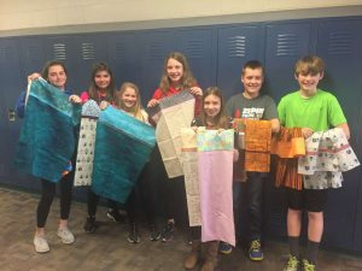Local quilters from the Manistee Victorian Quilters Quild recently donated pillowcases to the Portager Pride Pack program, and the Portage Lake Association will be hosting a shoe drive. (Courtesy Photo)