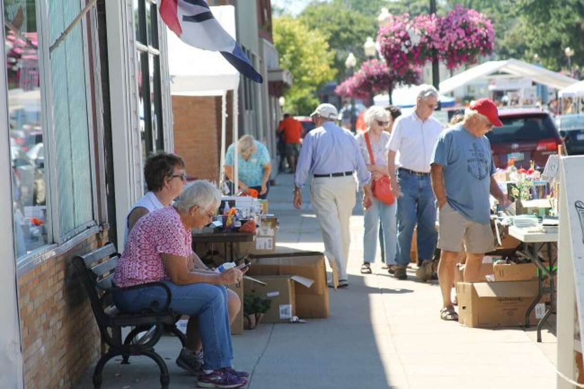 The downtown area is a hub of activity in the summer, and city officials are looking to fill vacant buildings in the district and bring in new businesses. (News Advocate File Photo)