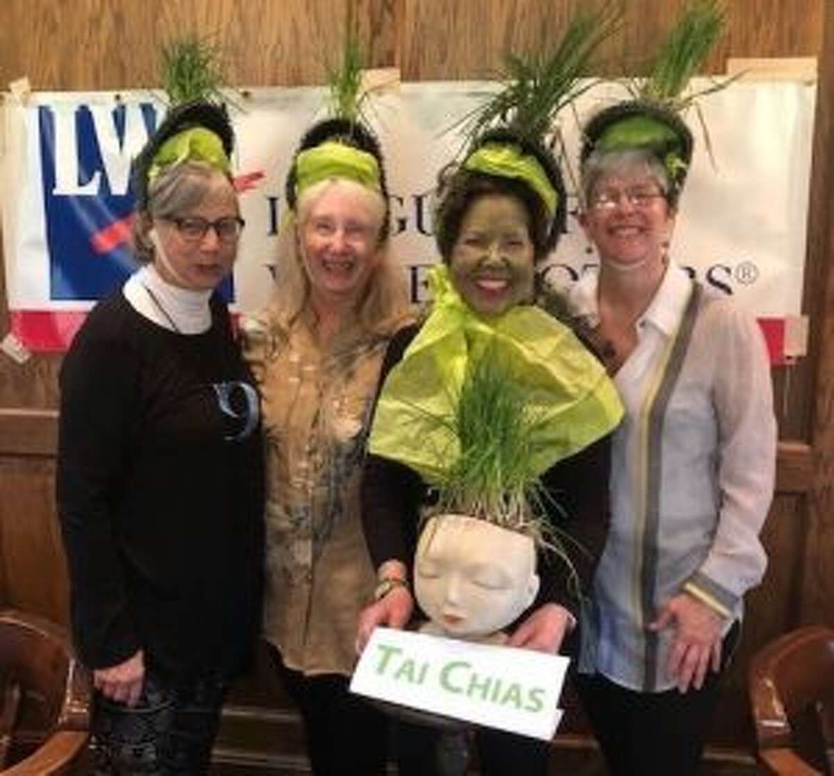 Tai Chias-Chia Pets won Best Costume during the Pictionary Olympics on April 26 at the Manistee Golf and Country Club. The event is a fundraiser for the League of Women Voters Manistee County. Pictured are team members Gail Tooley, Peg Connor, Mary Marshall and Julia Davidson. (Courtesy photo)