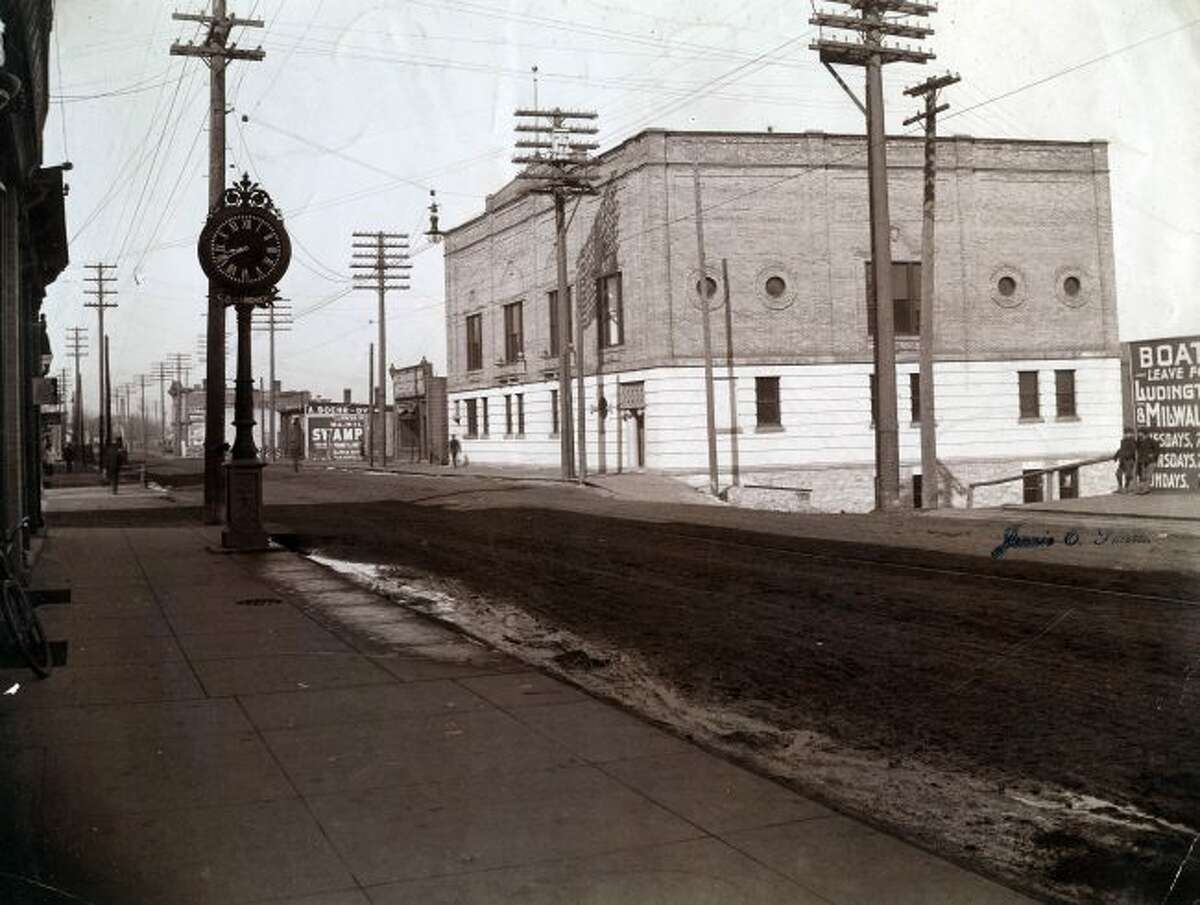 This early 1900 photograph of River Street looking west shows the Manistee Elks Lodge as being one of the main structures.