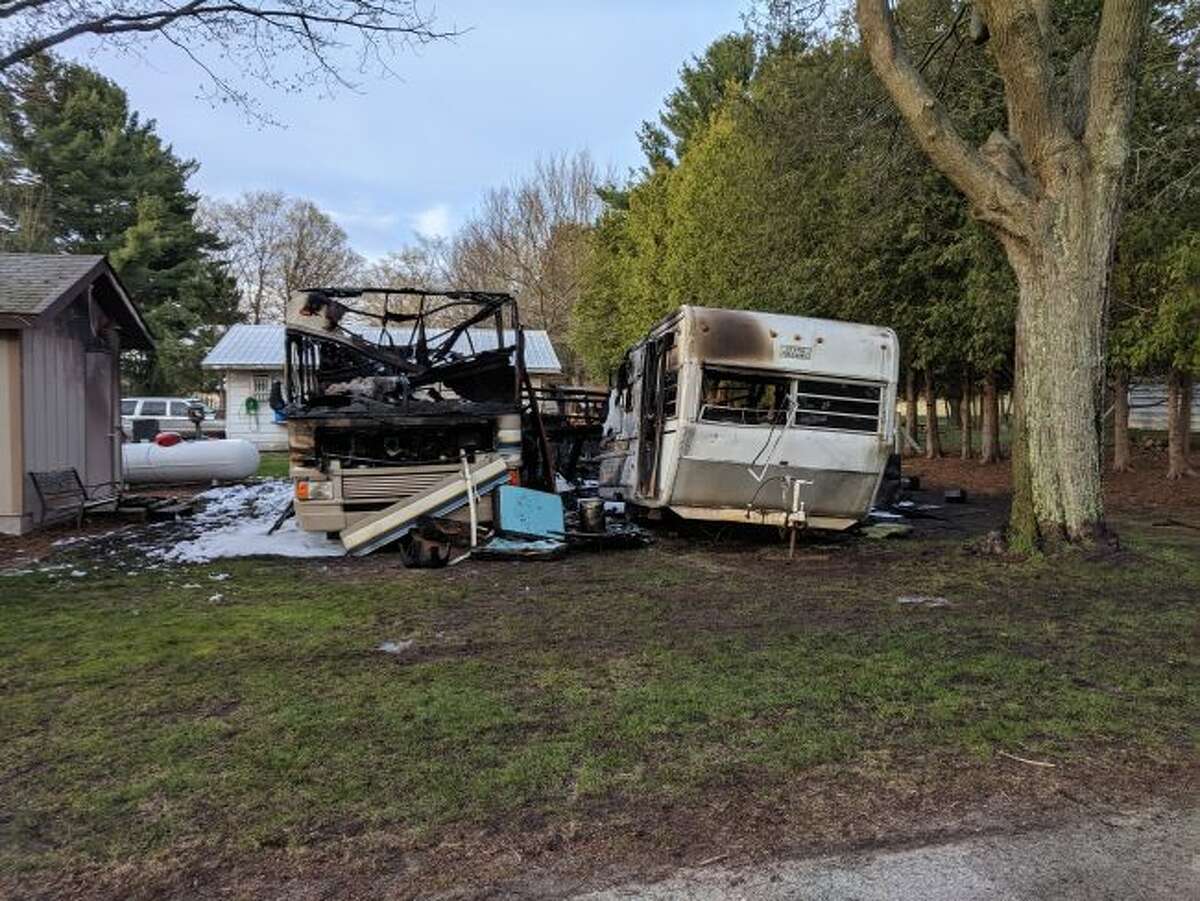 A fire was reported in Arcadia Township on Friday that left a camper trailer and motorhome badly burned. (Courtesy Photo/Wesley Smeltzer)