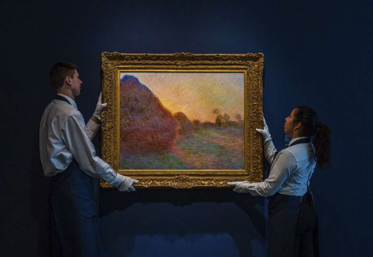 This undated photo provided by Sotheby's shows Claude Monet's painting titled "Meules." The painting, one of Monet's iconic paintings of haystacks, has fetched a record $110.7 million at an auction in New York. The 1890 painting sold at Sotheby's sale of Impressionist & Modern Art Tuesday night, May 14, 2019. (Courtesy Sotheby's via AP)