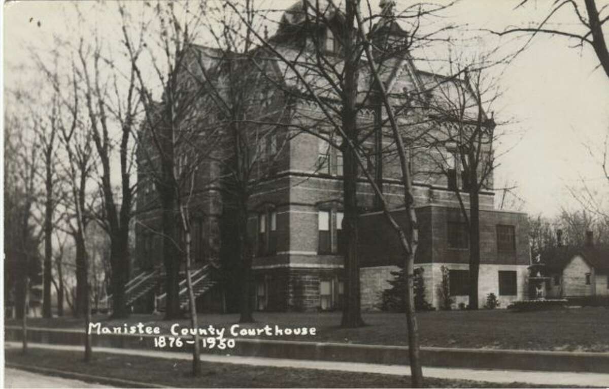 The old Manistee County Courthouse building is shown in this early 1900 photograph.