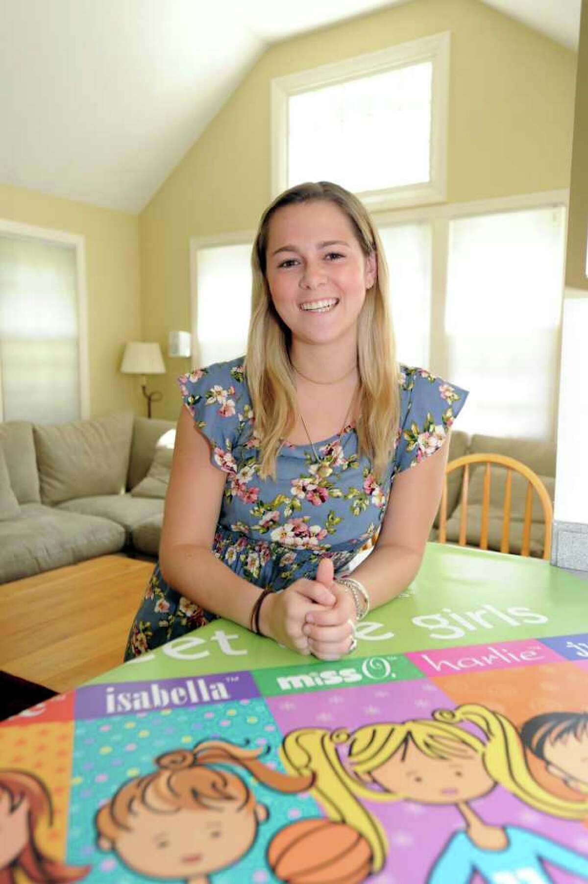Juliette Brindak, 21, co-founder and CEO of missoandfriends.com, a viral website that started up in 2005, at home. Julie sits in the family room on Monday, August, 2, 2010.