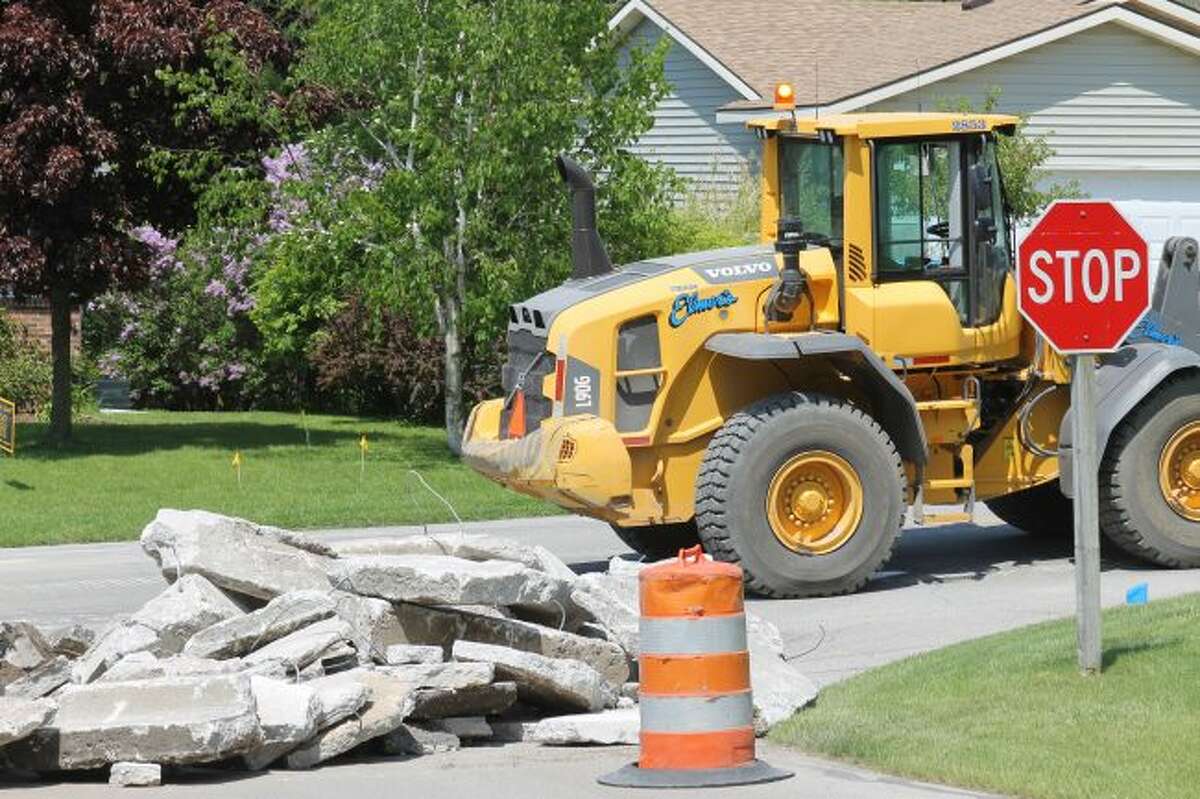 Construction work on 12th Street in Manistee started to pick up on Tuesday afternoon. (Ashlyn Korienek/News Advocate)