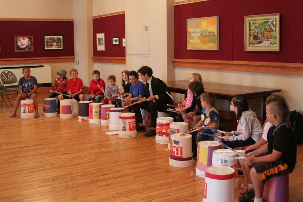 Bucket drumming class brings creative composition to community