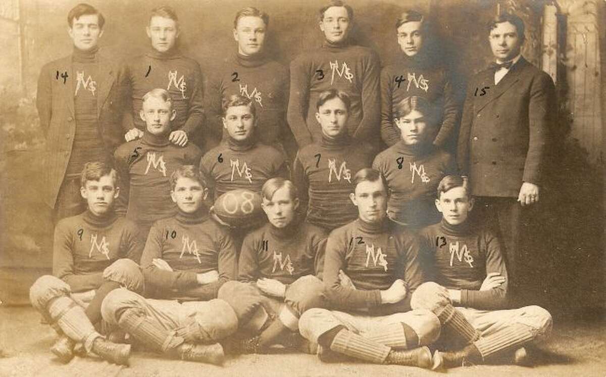 The 1908 Manistee High School football team is shown in this team photo.