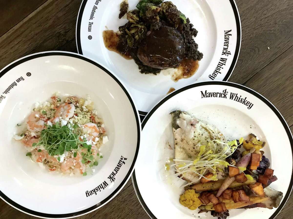 A trio of dishes including cilantro lime shrimp tabbouleh, Sam's filet and redfish on the half-shell from Maverick Whiskey