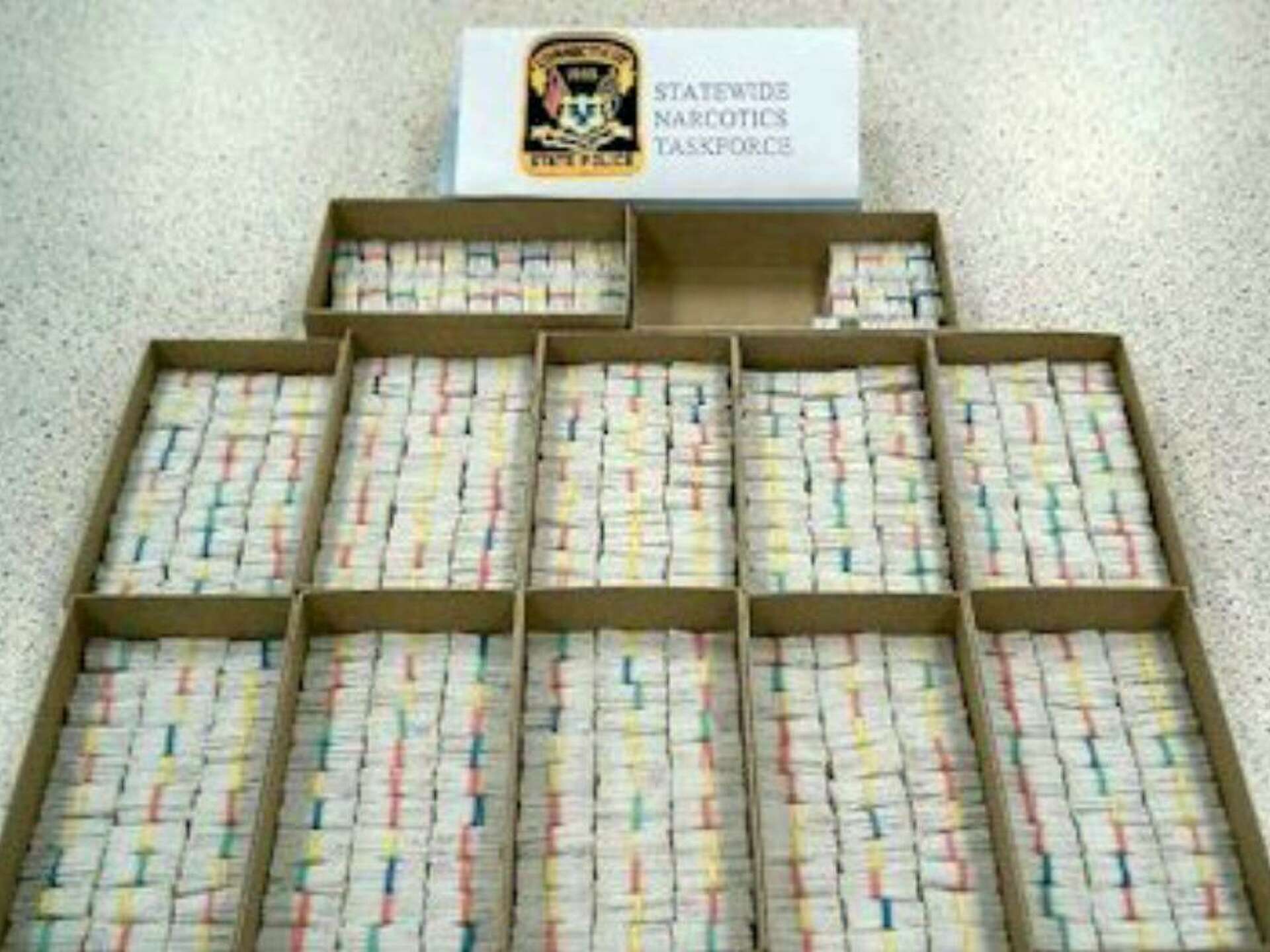 Two arrested on drug charges, 4,000 bags of heroin seized