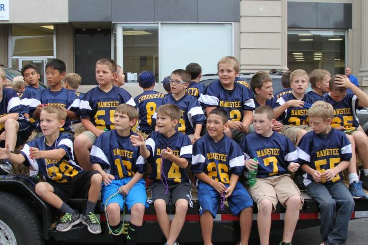 This group of future Chippewa football players enjoy the homecoming parade.