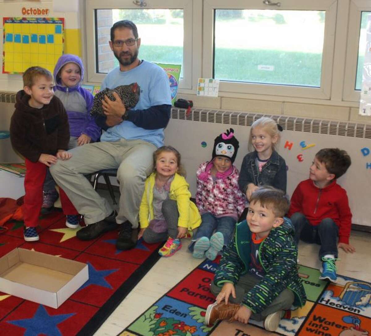 Trinity Lutheran School pre school students study chickens