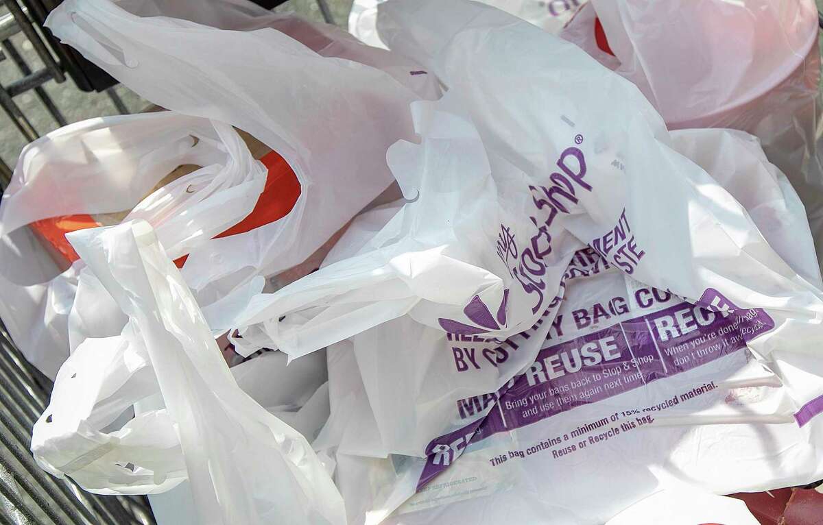 This photo shows plastic bags at Stop & Shop in Wallingford, Conn. The grocery store chain says it is eliminating single-use plastic bags at checkout at its Connecticut stores. (Dave Zajac/Record-Journal via AP)