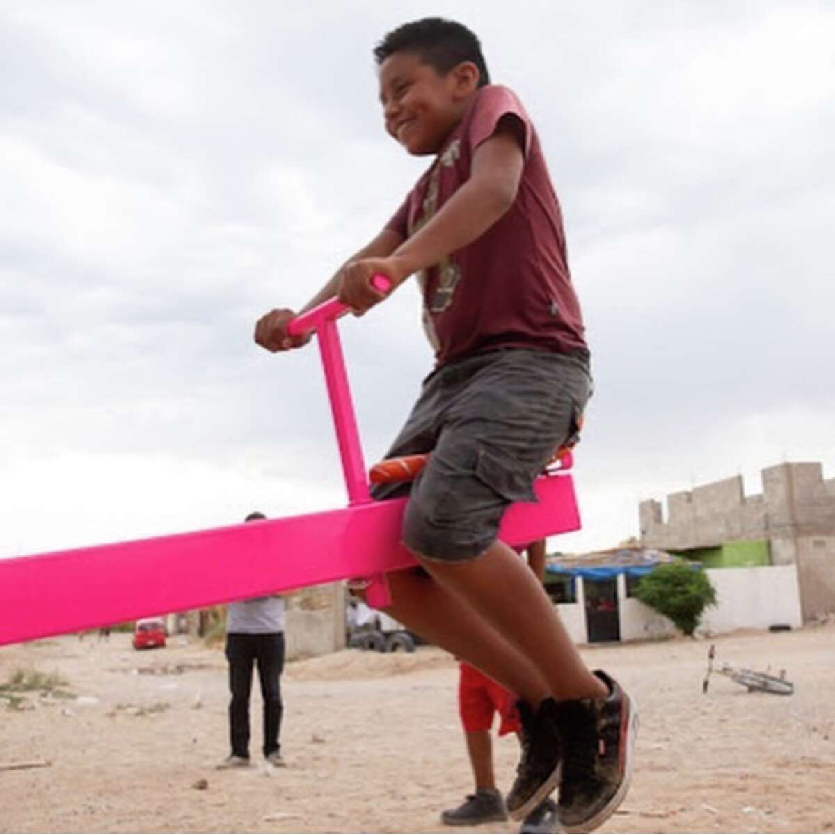 Bay Area professors install seesaw at USMexico border wall