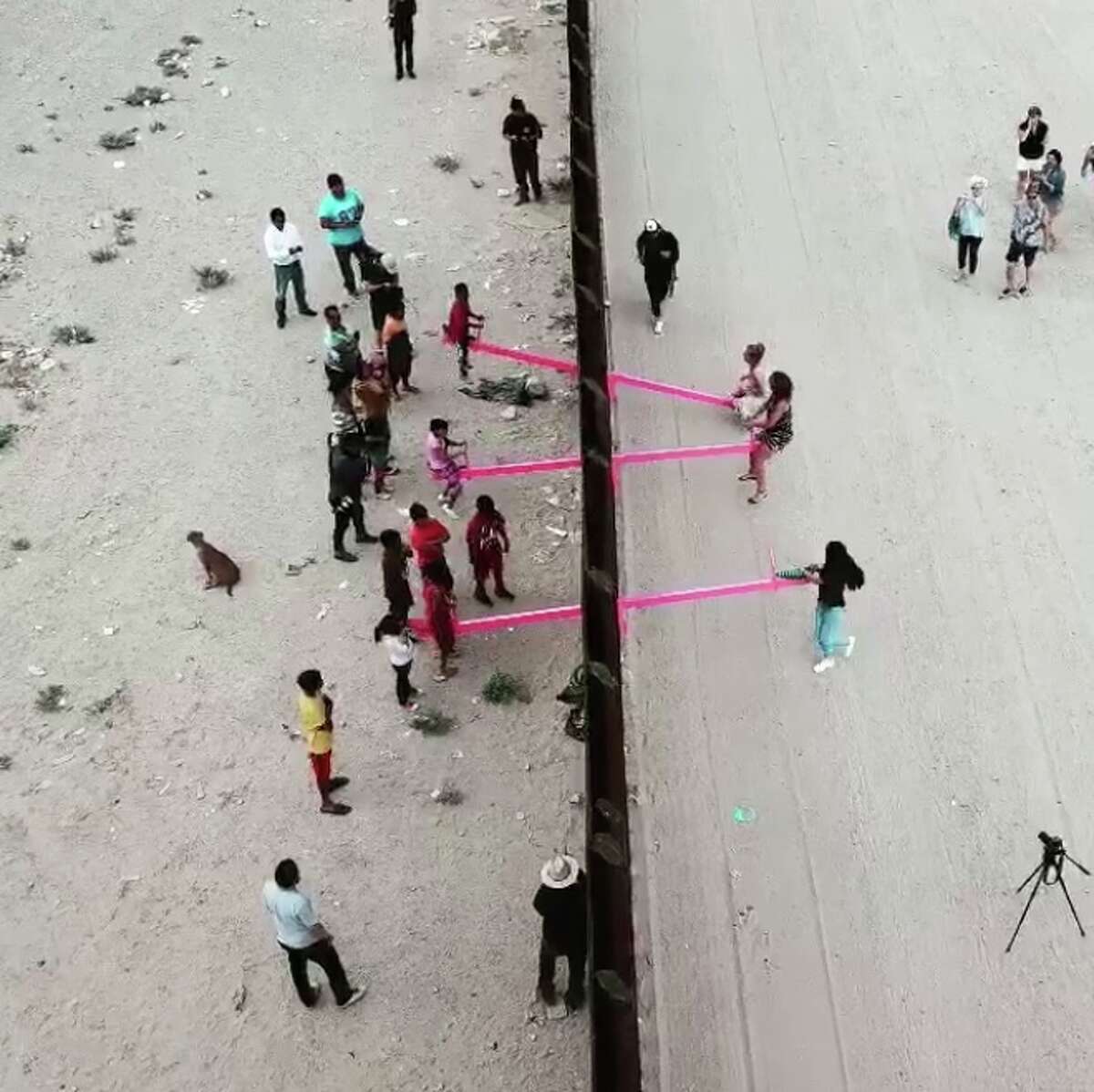 Bay Area professors install seesaw at USMexico border wall