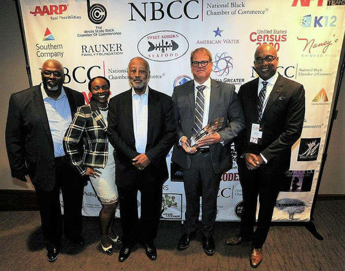 From left, Larry Ivory, President/CEO of the Illinois Black Chamber of Commerce; Rhonda Carter Adams, Illinois American Water Diversity Lead; Harry C. Alford, President/CEO of the National Black Chamber of Commerce; Bruce Hauk, Illinois American Water President; and James F. Clayborne, Jr., former Illinois State Senator.