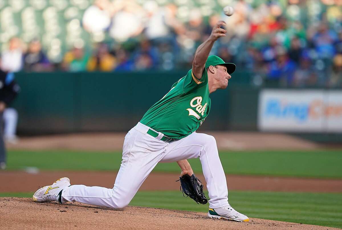 OAKLAND, CA - JULY 30: Chris Bassitt #40 of the Oakland Athletics pitches against the Milwaukee Brewers in the top of the first inning at Ring Central Coliseum on July 30, 2019 in Oakland, California. (Photo by Thearon W. Henderson/Getty Images)