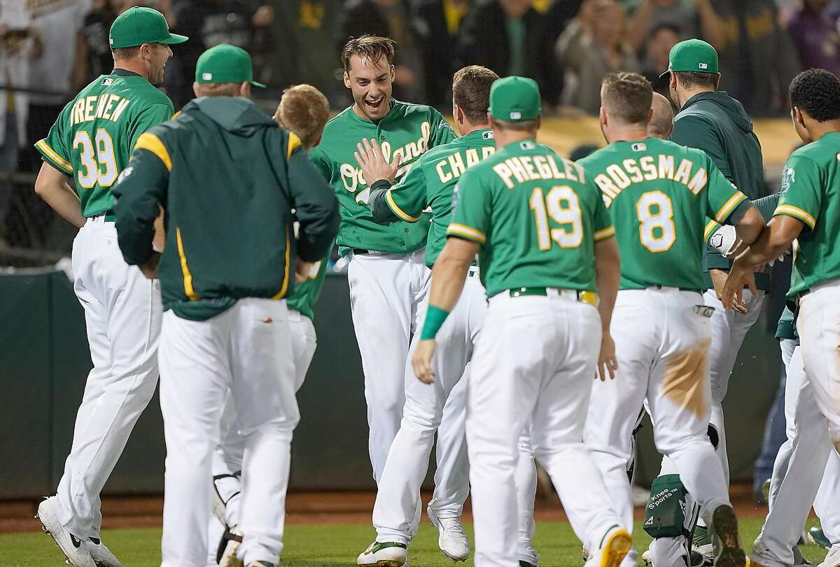 Matt Olson of the Oakland Athletics rounds the bases after hitting a  News Photo - Getty Images