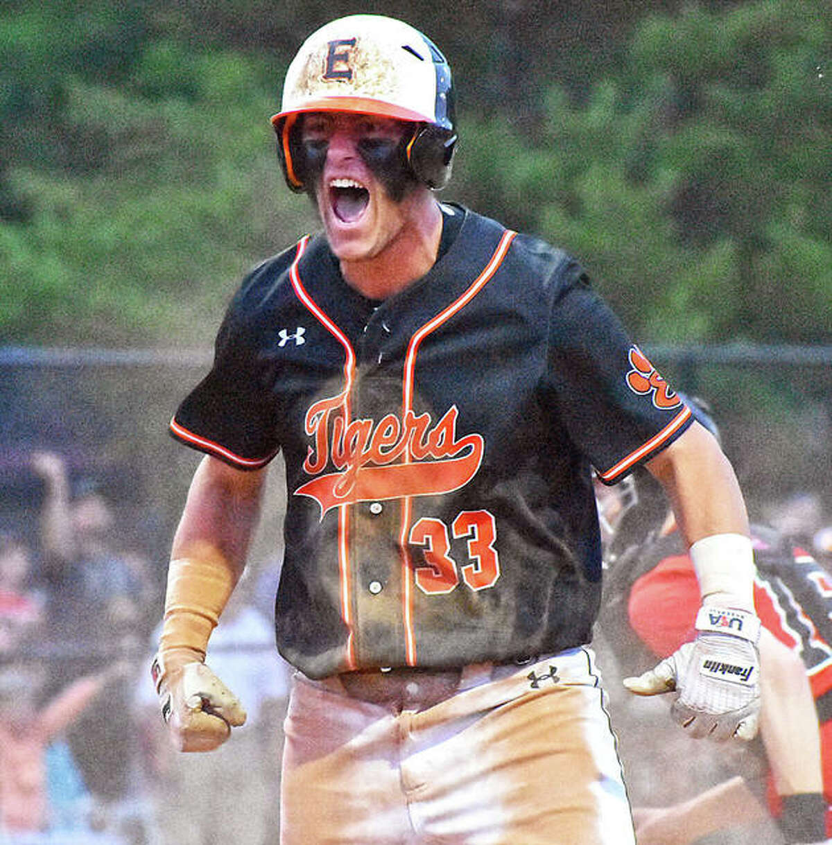 Edwardsville’s Drake Westcott reacts after scoring the go-ahead run in the Tigers’ Class 4A super-sectional victory over Chicago Marist on June 3 in Springfield.