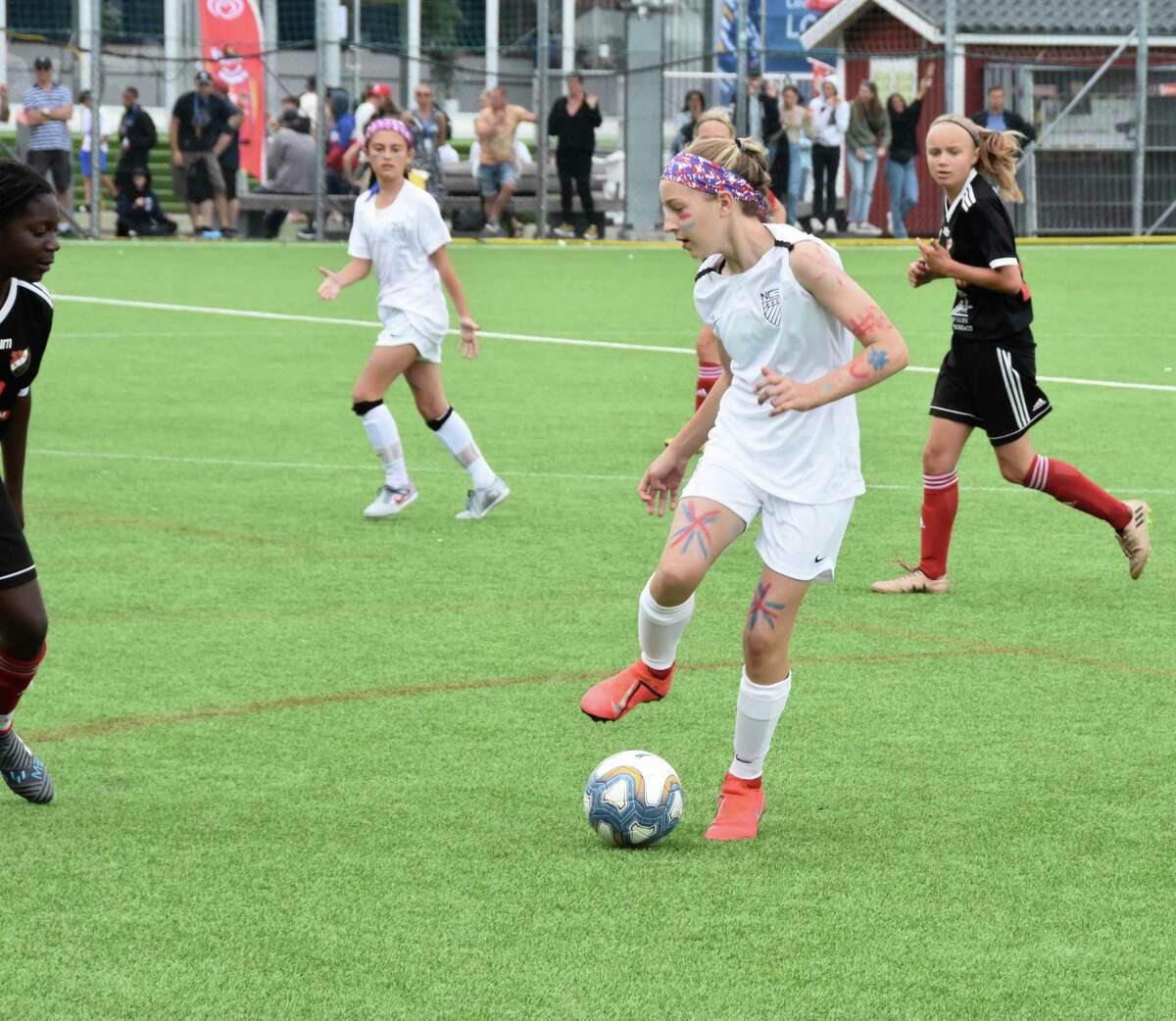 Sara Rieger controls the ball during a game at the Gothia Cup in Sweden.