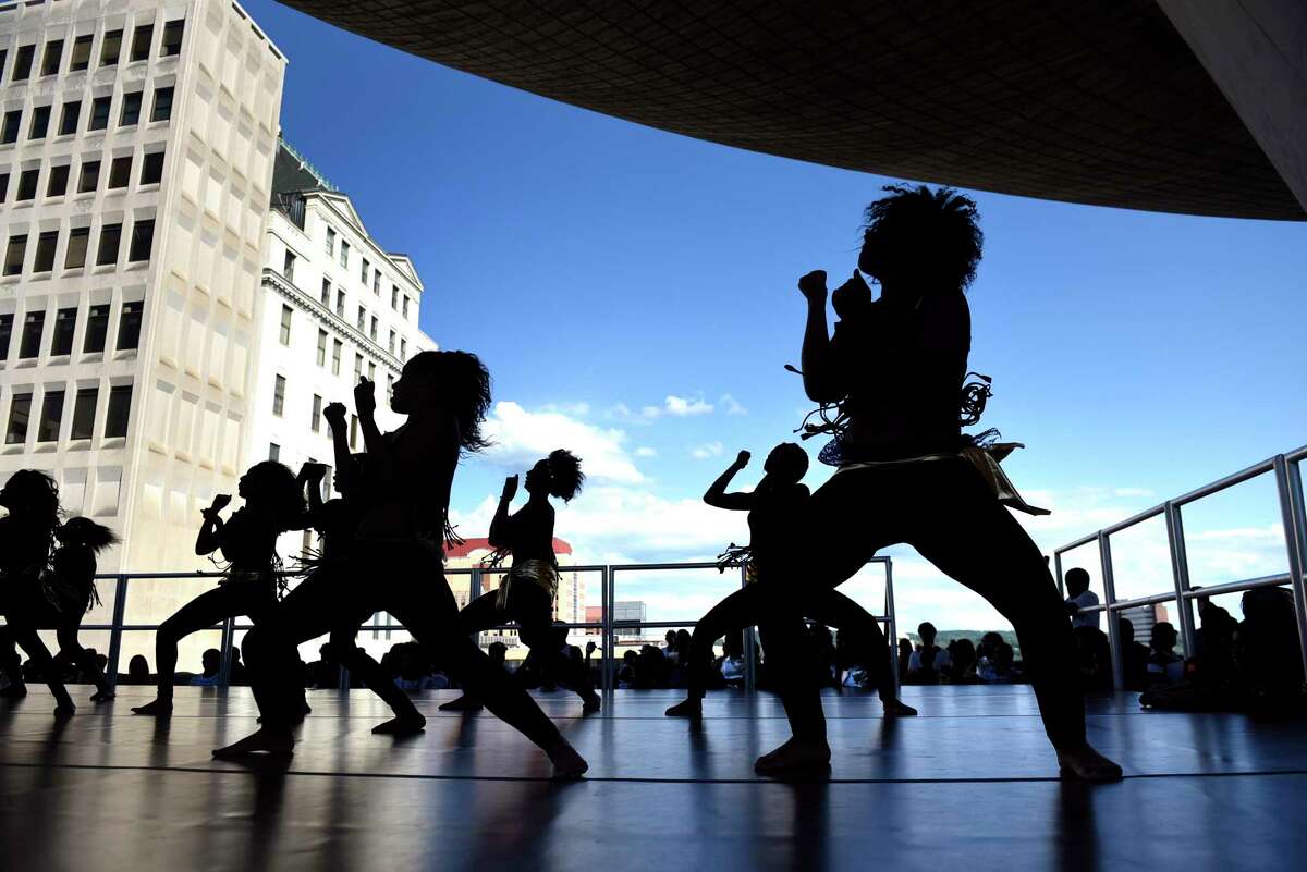 Dynasti, an Arbor Hill community dance troupe for girls ages 7 to 19, perform in the shadow of The Egg during the Black Arts and Cultural Festival on Saturday, Aug. 6, 2016, at the Empire State Plaza in Albany, N.Y. (Cindy Schultz / Times Union)
