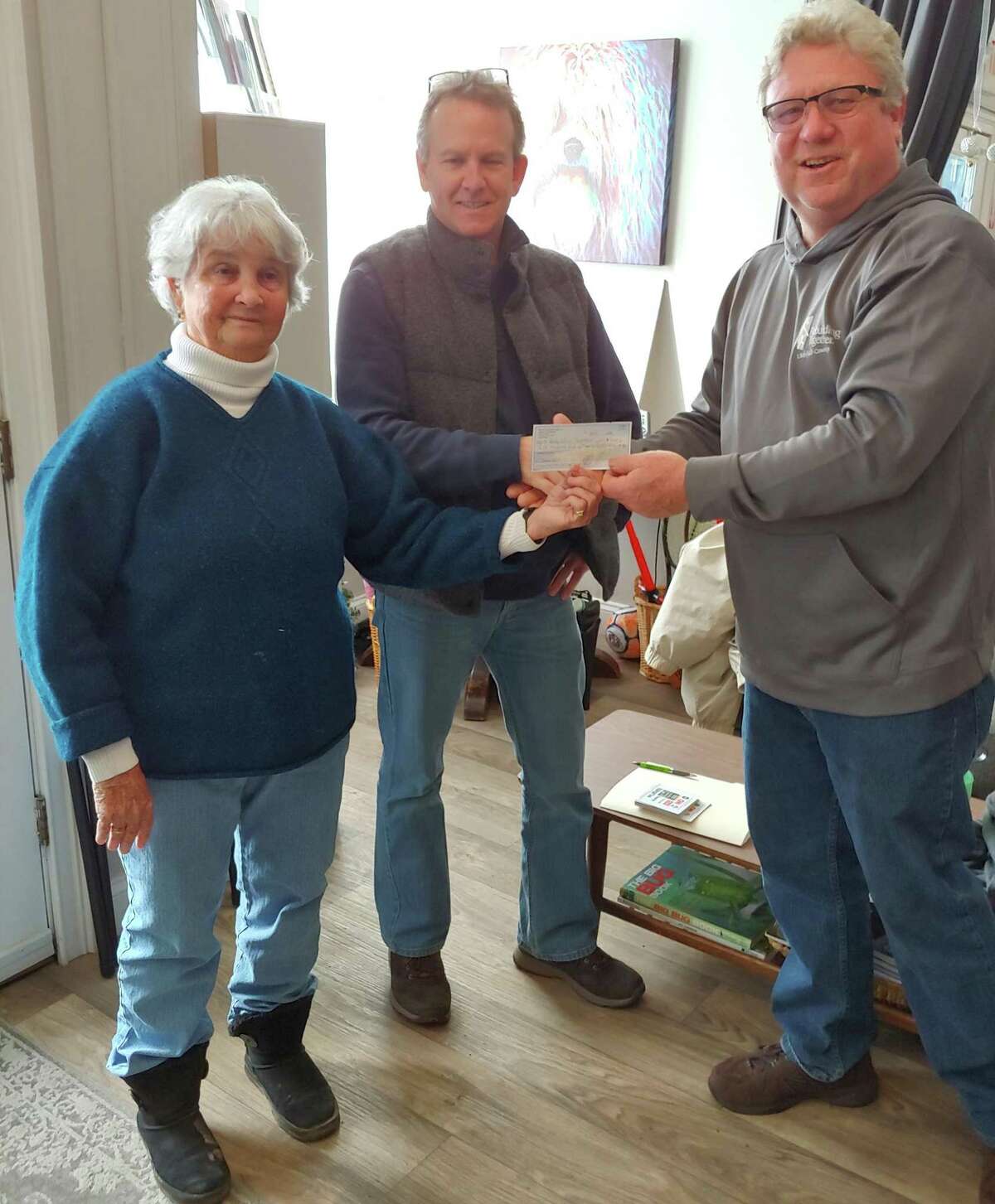 Ceia Webb, left, executive director of Rebuilding Together Litchfield County, accepts a check from Litchfield realtor Steve Schappert, along with Mike Bogues, chairman of the Litchfield County Rebuilding group, right. The funds will help the organization as they plan to repair ten houses in Litchfield County on April 27. The group has helped with important home repairs that contribute to warmth and safety for senior citizens, serving 241 applicants and 387 persons over the past 15 years. For more information about the group (volunteers are needed), email info@rebuildingtogetherlitchfield.org or call 860-350-2290.
