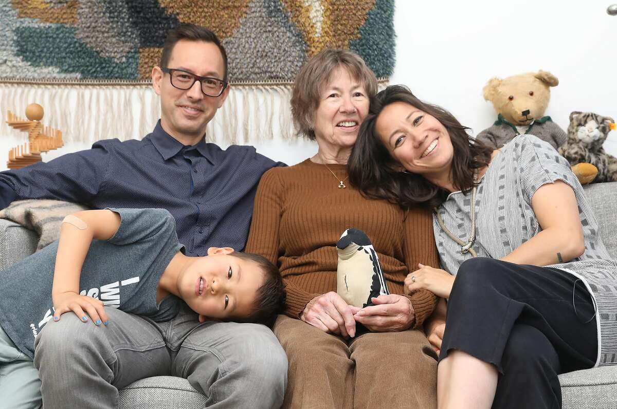 on Thursday, July 18, 2019 in Oakland, Calif. “Kleines Haus,” a simple, sleek tiny home designed by Peter Liang, architect and founder of Blue Truck Studio, for his mother, Irmhild. Tucked behind the house in Oakland Lake Merritt that his sister Stefanie shares with her husband Mike Chung and their two young children, Otto, 4, and Liezl, 2, the space measures clocks in just over 300 square feet with a minimalist, Scandinavian sensibility. SHOT LIST: *Need a strong vertical for the poster cover of Style. *Photos of the unit, nestled on a grade behind the main house. *Shots of the family -- grandma with children and grandchildren (if available) together outside the unit. *Interiors shots of the unit's common space. Please avoid distortion in photos. *Detail shots of the nifty space saving features, including murphy bed, storage, concealed loft, scaled-down replica of the Liang’s family home in Newton, Mass. that Irmhild began building in a woodworking class.